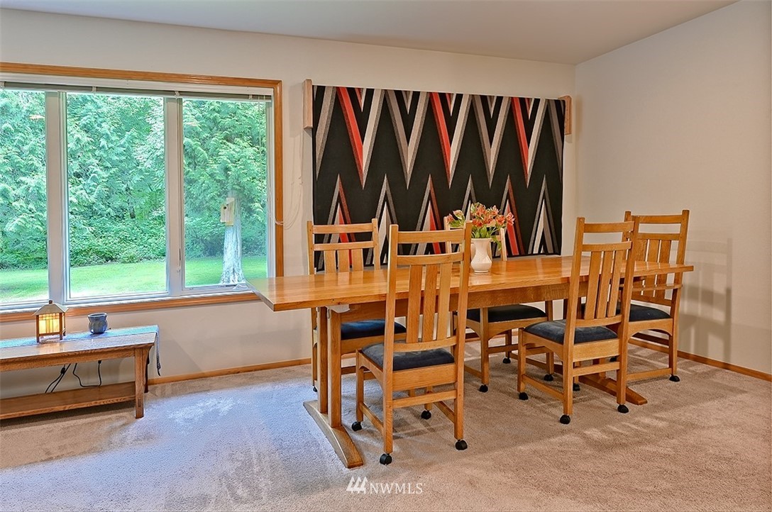 4192 West Road Blaine, WA 98230 - Photo 11 of 27 a view of a chairs and table in a room