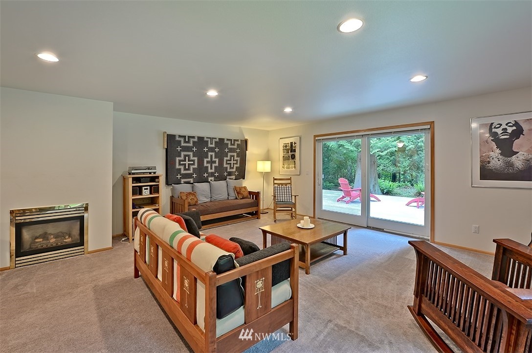 4192 West Road Blaine, WA 98230 - Photo 13 of 27 a living room with furniture and a flat screen tv