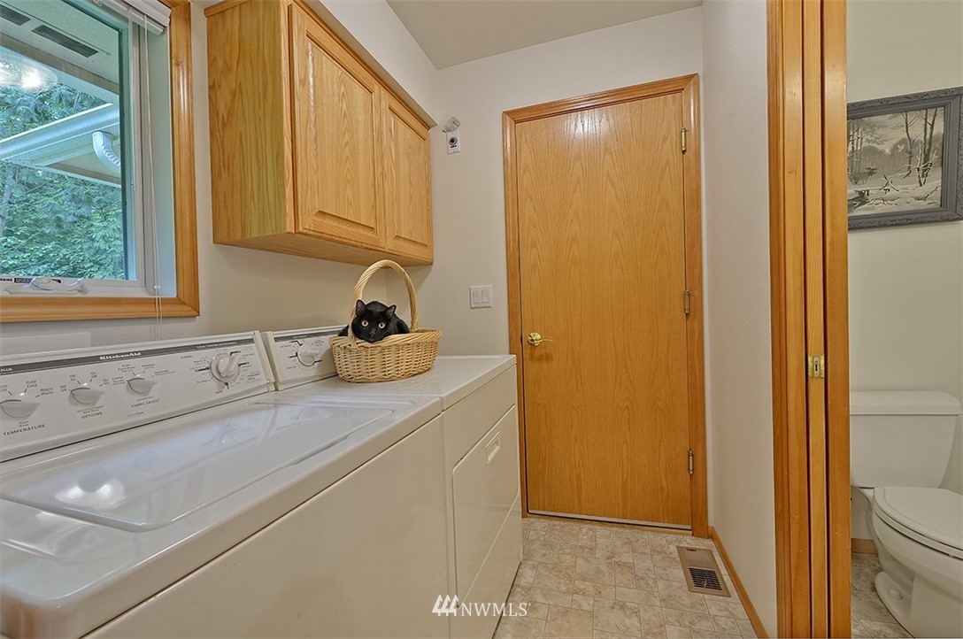 4192 West Road Blaine, WA 98230 - Photo 16 of 27 a bathroom with a sink a toilet and a shower