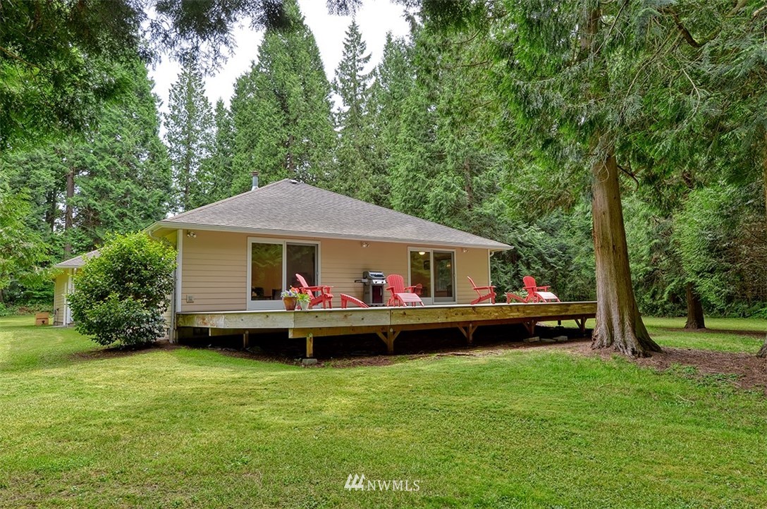 4192 West Road Blaine, WA 98230 - Photo 3 of 27 a front view of a house with garden