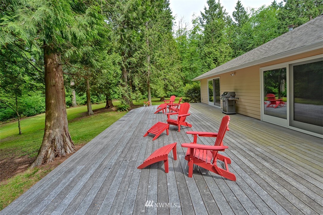 4192 West Road Blaine, WA 98230 - Photo 5 of 27 a view of deck with table and chairs and wooden floor