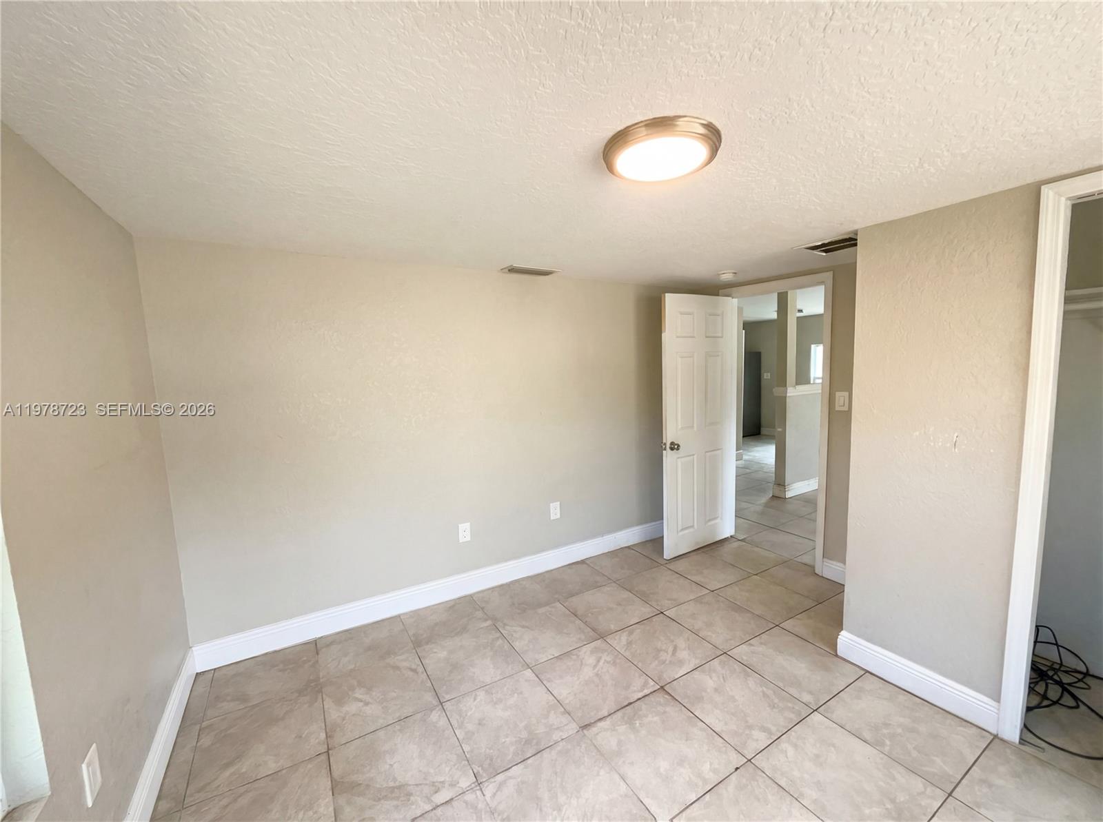 244 South Rhodes Street Mount Dora, FL 32757 - Photo 4 of 19 a view of an empty room