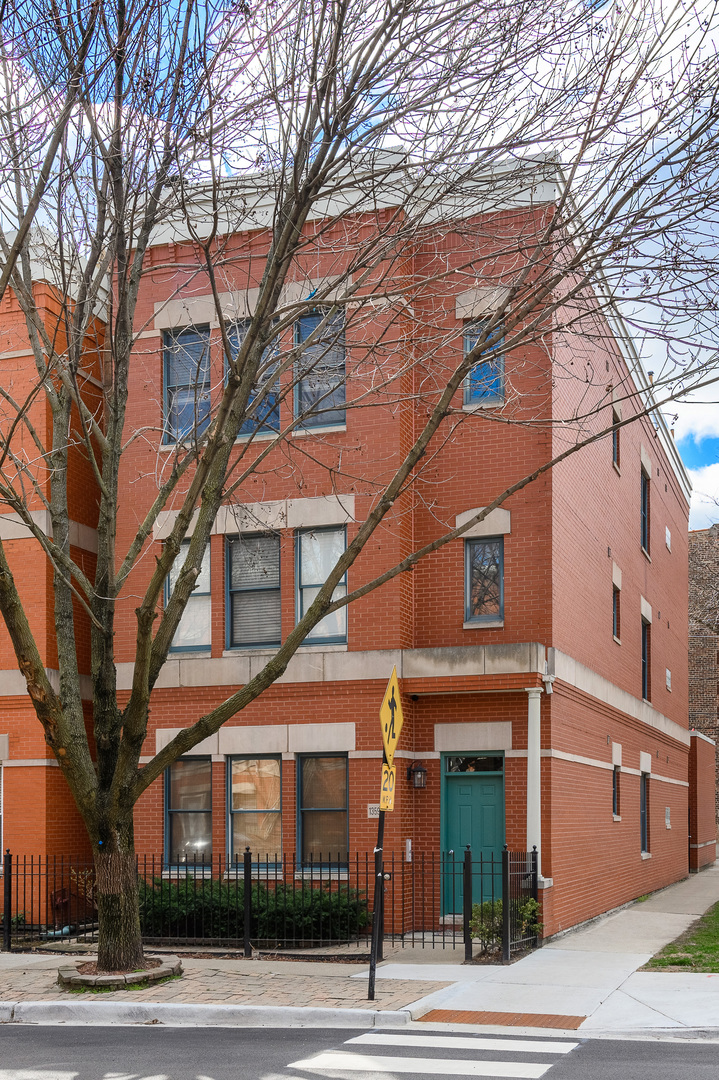1359 West Fillmore Street, Unit A Chicago, IL 60607 - Photo 1 of 19 a view of a building and a tree