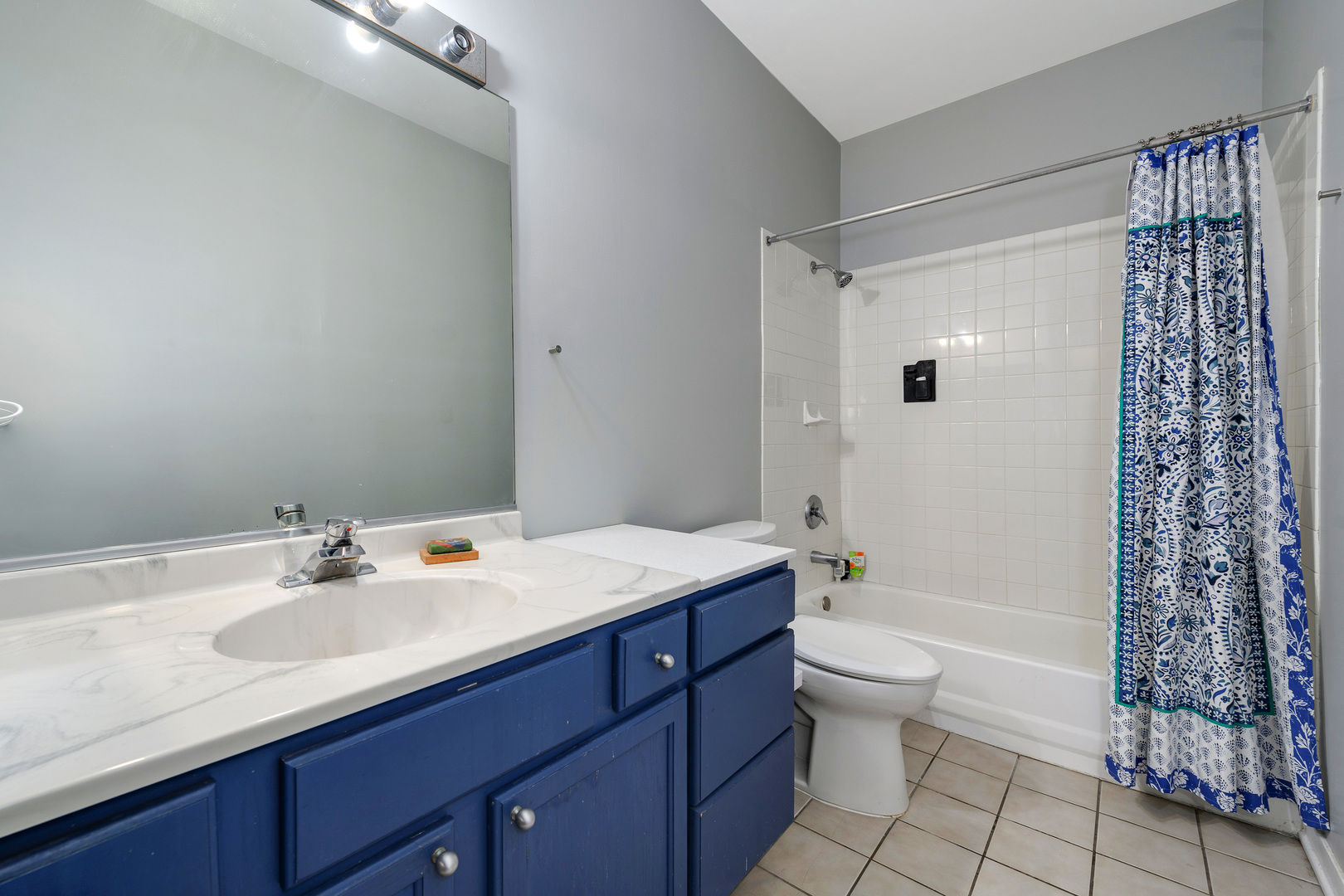 1359 West Fillmore Street, Unit A Chicago, IL 60607 - Photo 12 of 19 a bathroom with a sink a toilet and shower