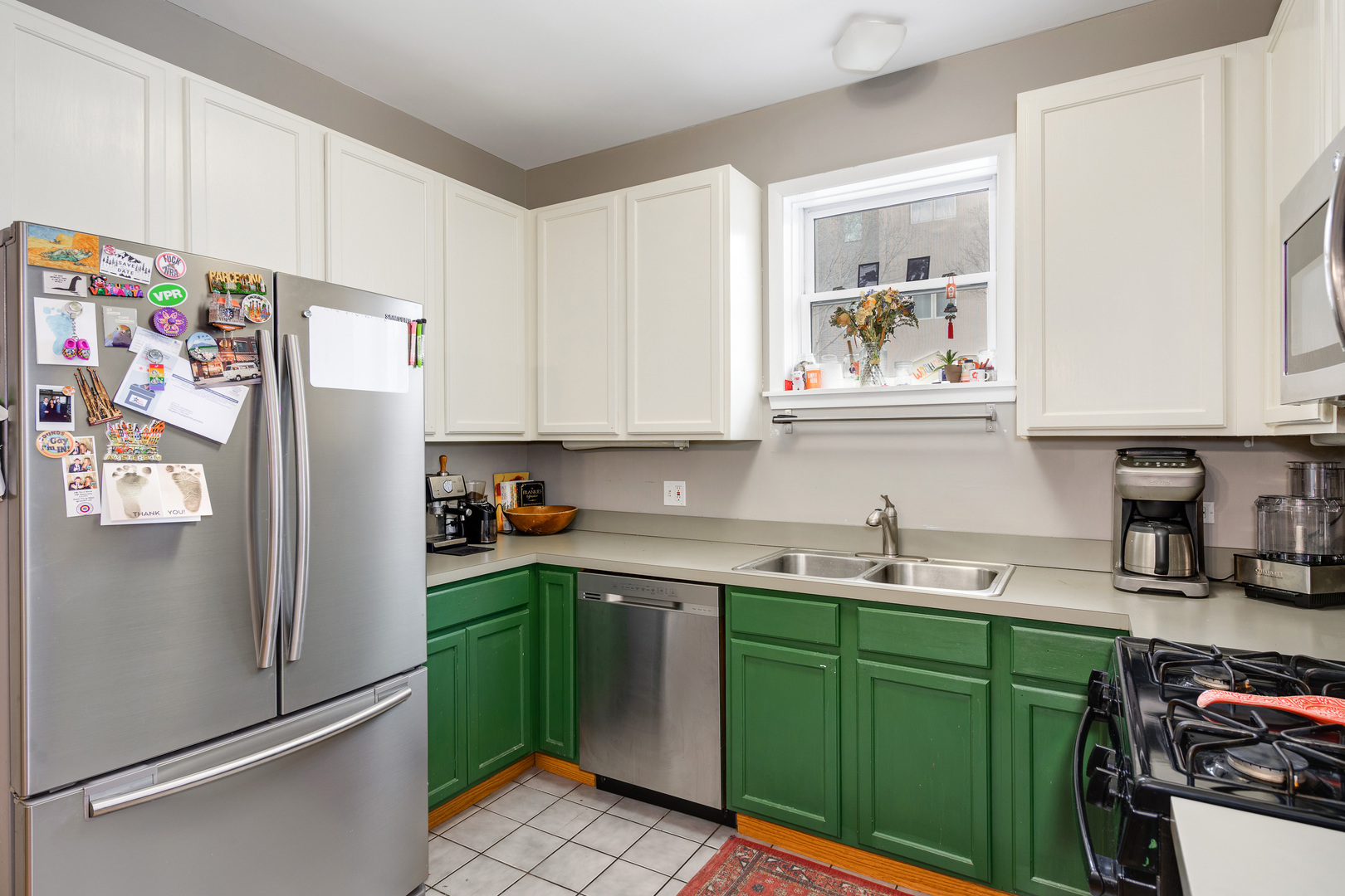 1359 West Fillmore Street, Unit A Chicago, IL 60607 - Photo 9 of 19 a kitchen with a refrigerator and a sink