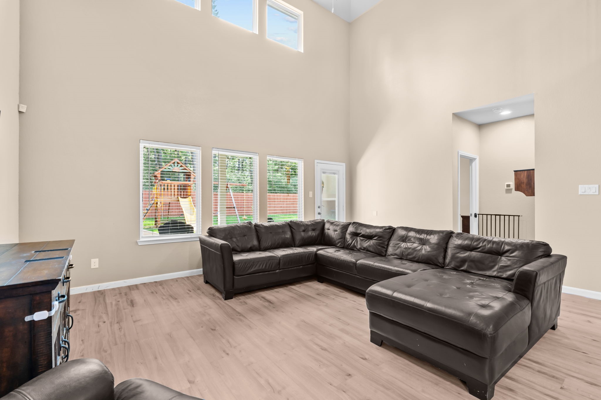 14388 Zion Gate Crossing Conroe, TX 77384 - Photo 12 of 33 a living room with furniture and a flat screen tv