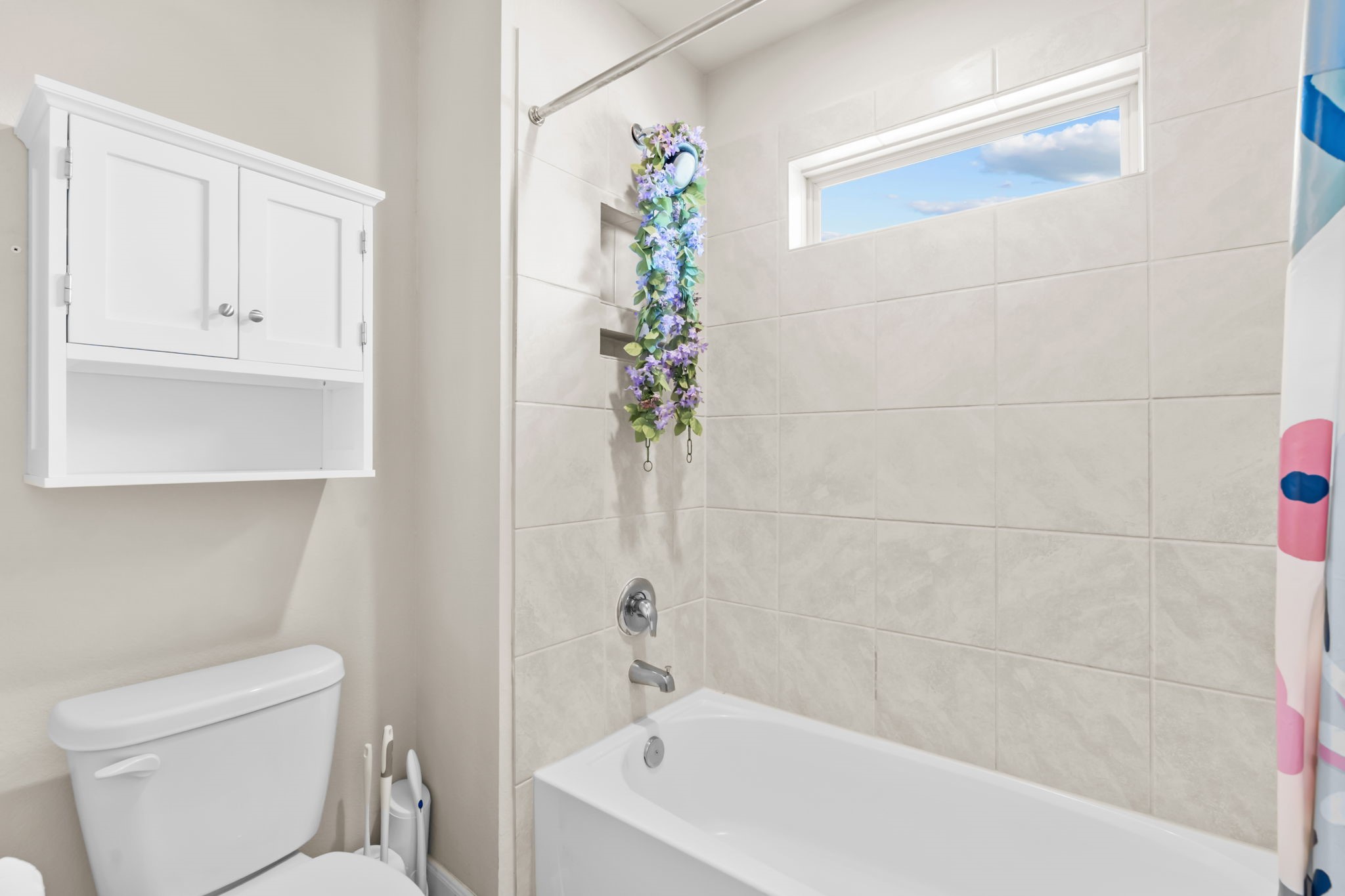 14388 Zion Gate Crossing Conroe, TX 77384 - Photo 24 of 33 a bathroom with a bathtub and shower