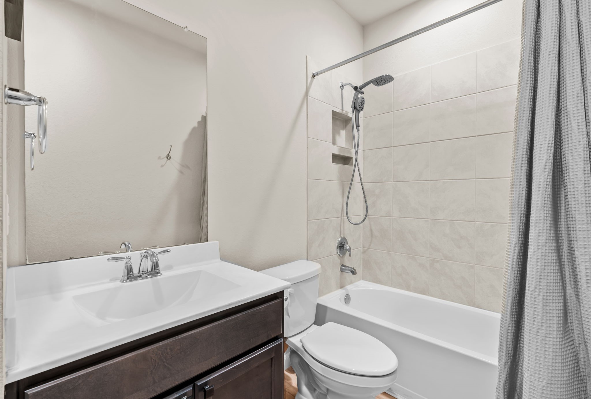 14388 Zion Gate Crossing Conroe, TX 77384 - Photo 9 of 33 a bathroom with a sink toilet vanity and shower