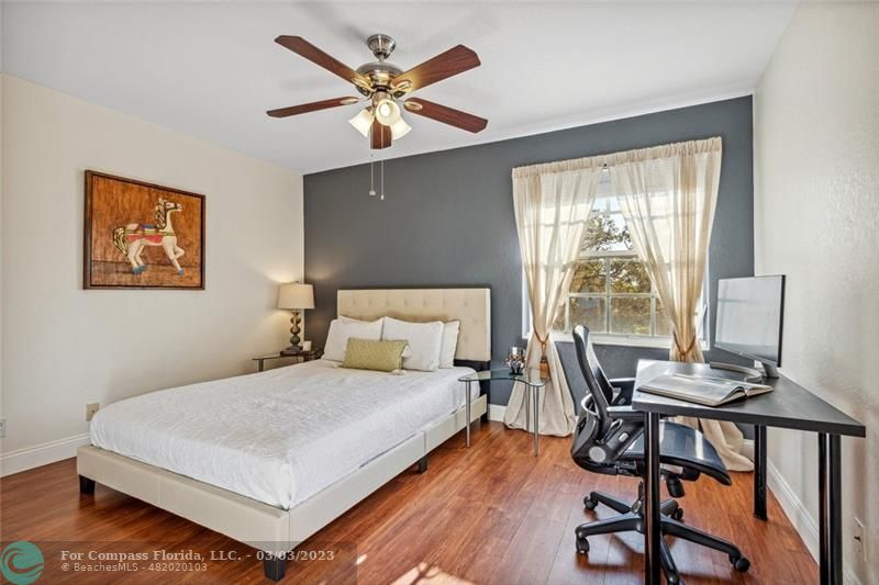 4290 Diamond Drive Weston, FL 33331 - Photo 15 of 26 a bedroom with a bed and a desk