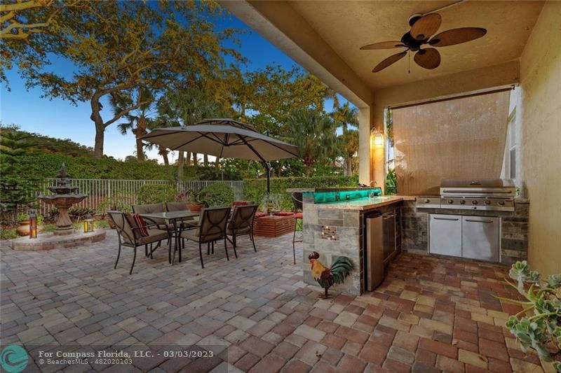 4290 Diamond Drive Weston, FL 33331 - Photo 24 of 26 a view of a patio with a table and chairs