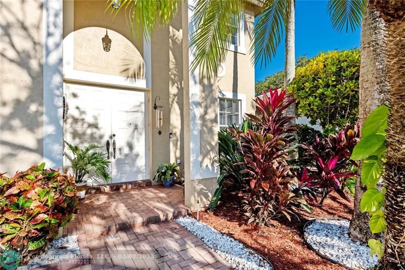 4290 Diamond Drive Weston, FL 33331 - Photo 3 of 26 a front view of a house with a yard