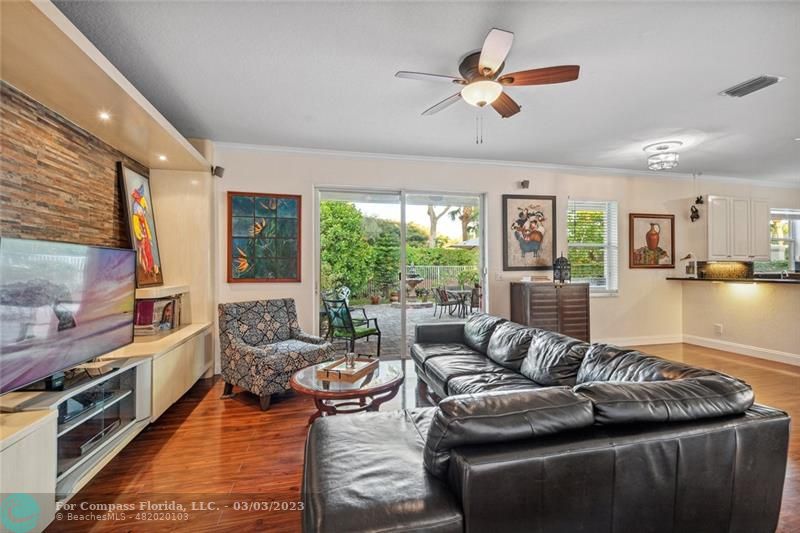4290 Diamond Drive Weston, FL 33331 - Photo 6 of 26 a living room with furniture fireplace and a large window
