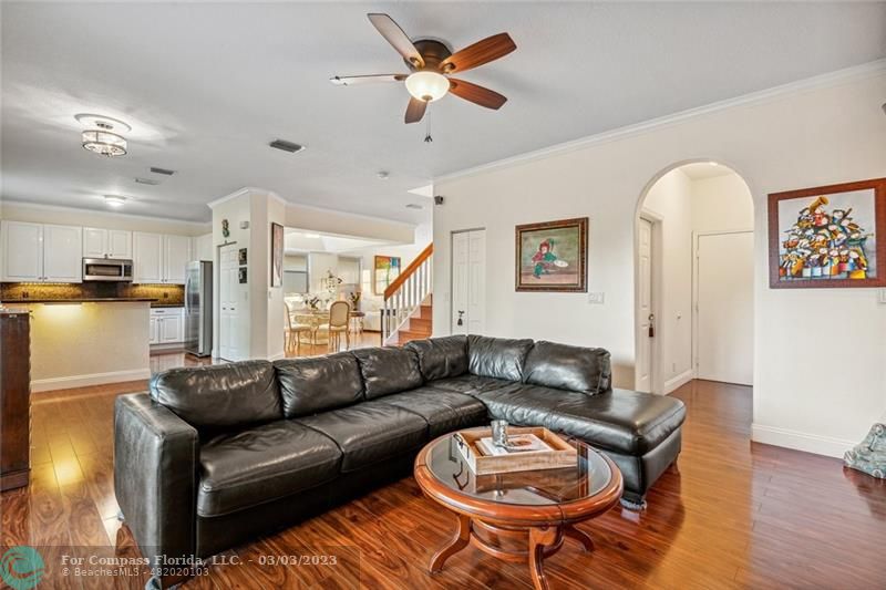4290 Diamond Drive Weston, FL 33331 - Photo 8 of 26 a living room with furniture a couch and a chandelier