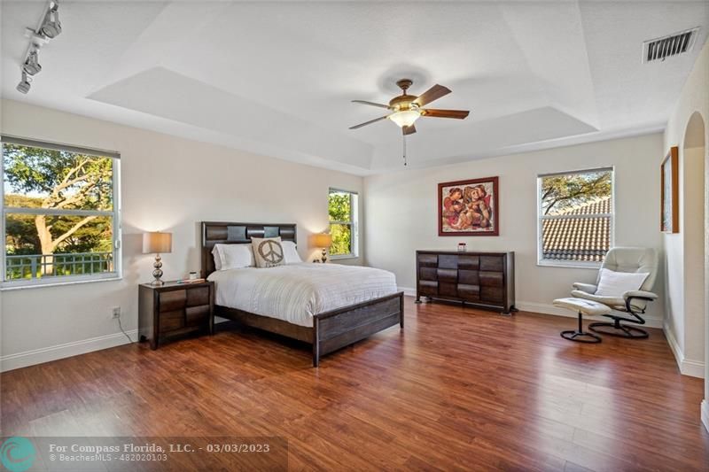 4290 Diamond Drive Weston, FL 33331 - Photo 10 of 26 a bedroom with a bed a couch and dresser