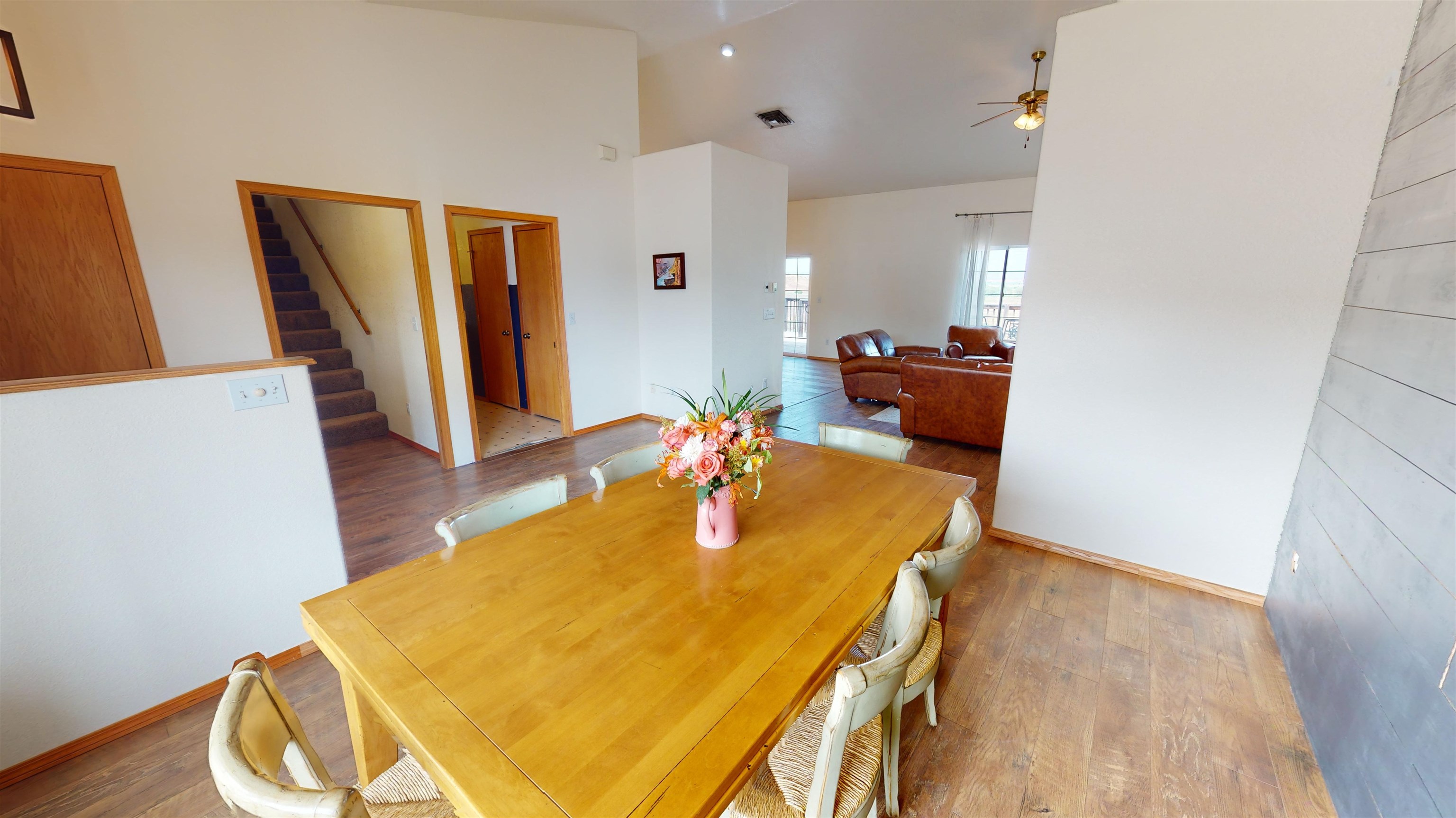 1664 Fowler Drive Fruita, CO 81521 - Photo 2 of 4 a room with wooden floor and furniture