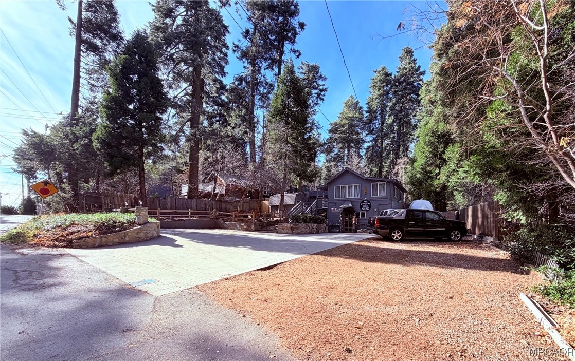 926 Kuffle Canyon Road Skyforest, CA 92385 - Photo 35 of 35 a building with trees in front of it
