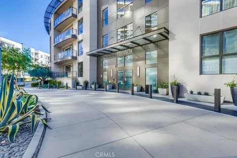 a view of kitchen with furniture and wooden floor