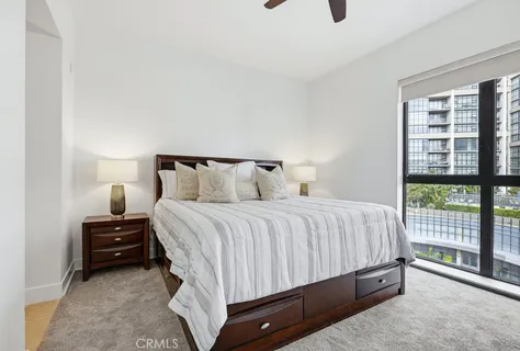 a view of a patio with couches and potted plants