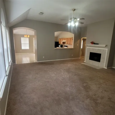 a view of a hallway with a glass door