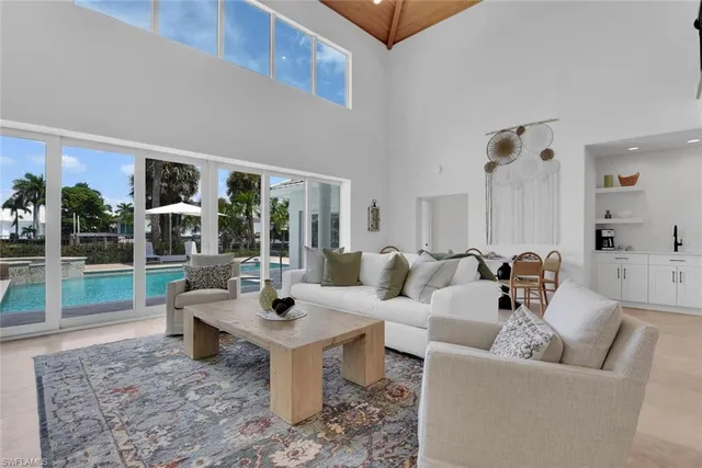 a living room with furniture and a table