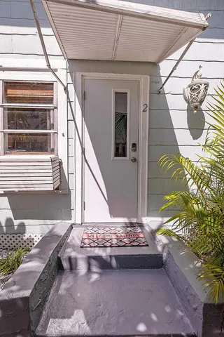 a view of entryway with a front door