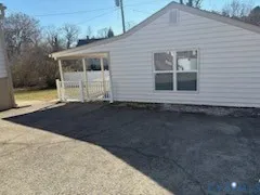 a kitchen with a dining table and chairs