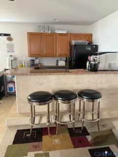 a view of a white house with a yard