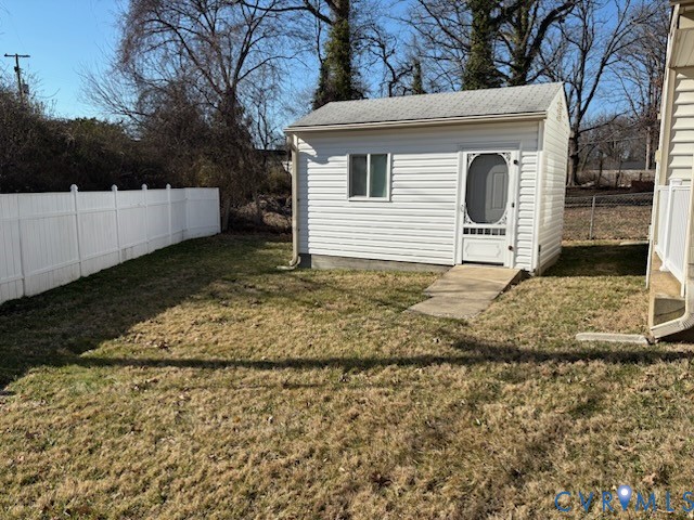 2820 Mauldin Street Richmond, VA 23223 - Photo 18 of 19 a view of a white house with a yard