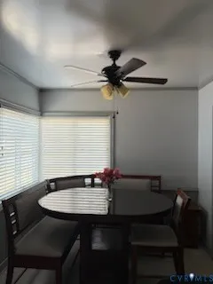 a view of a dining room with furniture