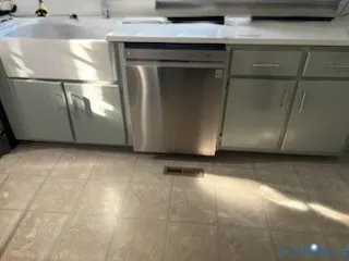 a view of a refrigerator in a kitchen