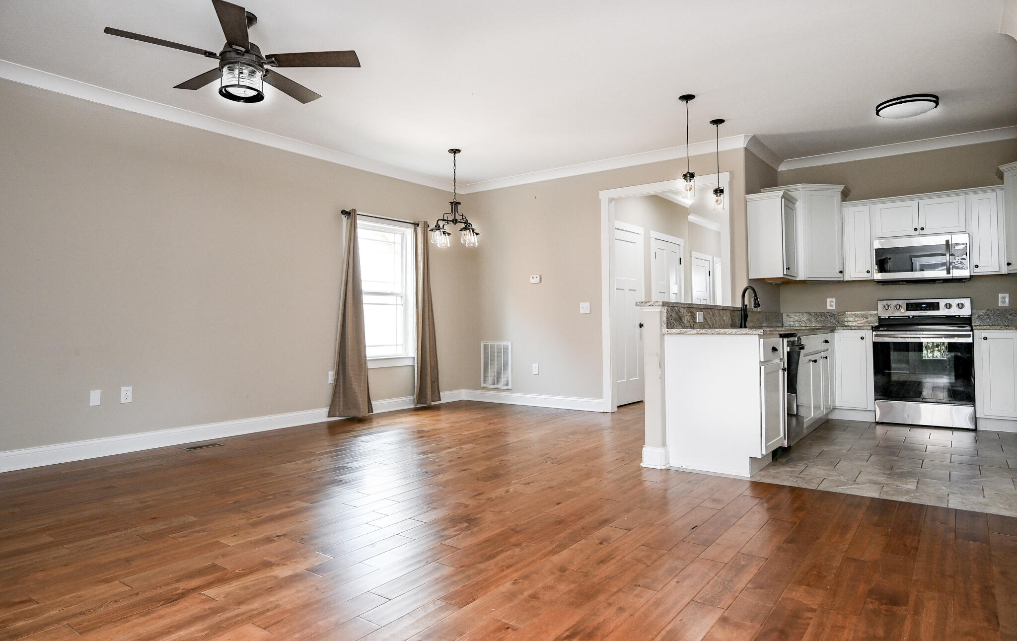 188 Winesap Way Southwest Cleveland, TN 37311 - Photo 20 of 48 Living Room/ Kitchen/Dining