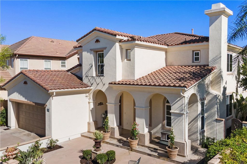 10 Plumbago Irvine, CA 92620 - Photo 10 of 16 a front view of a house