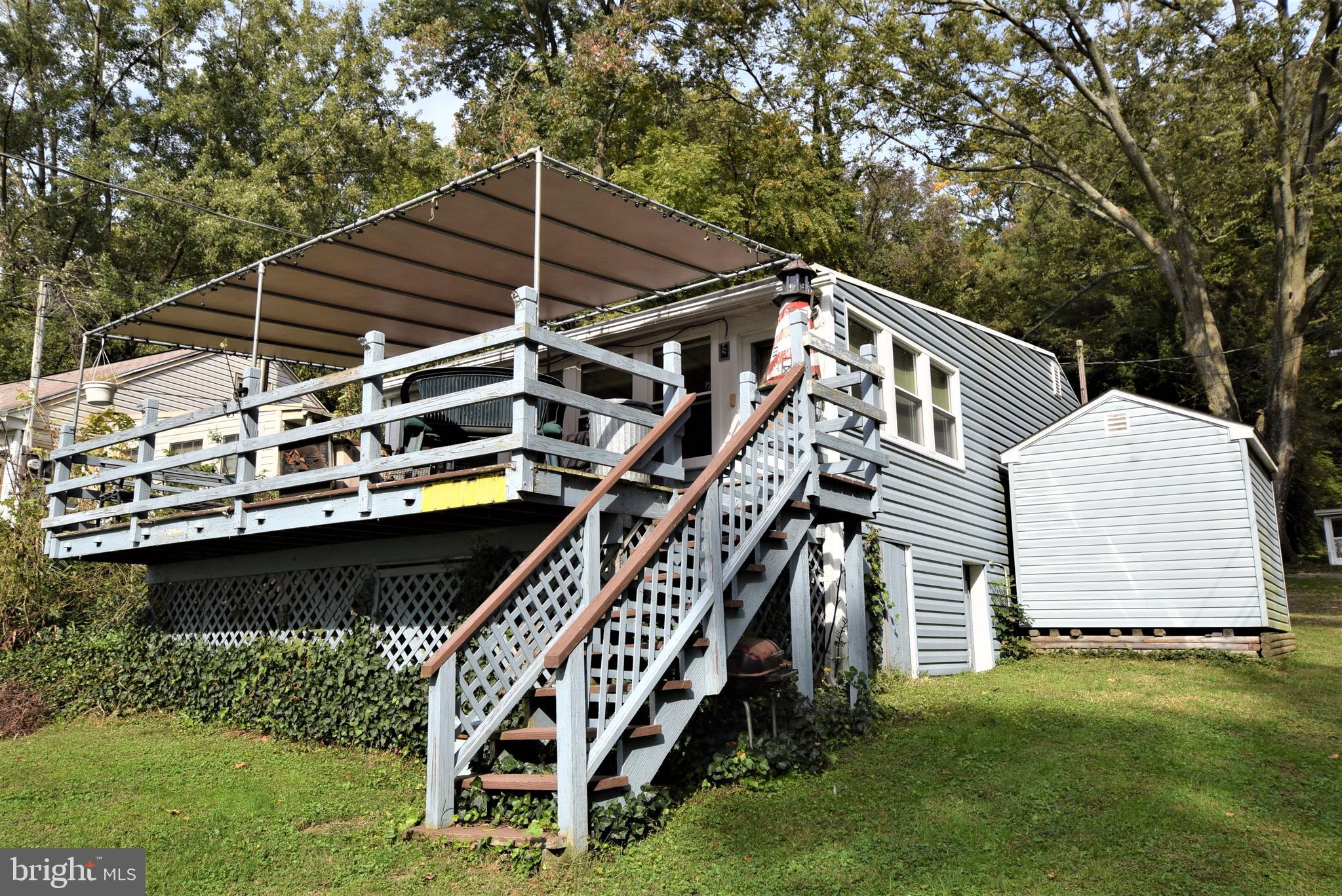 468 Peach Bottom Road Delta, PA 17314 - Photo 1 of 47 Front shaded porch entrance