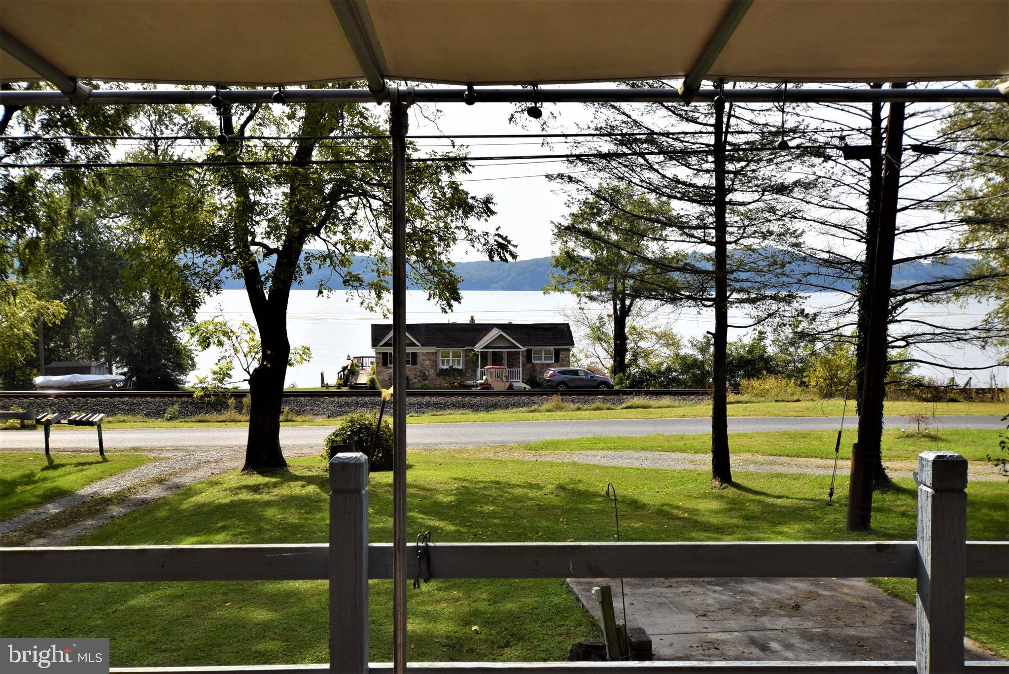 468 Peach Bottom Road Delta, PA 17314 - Photo 7 of 47 River view from front porch