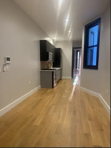 a view of a livingroom with a flat screen tv