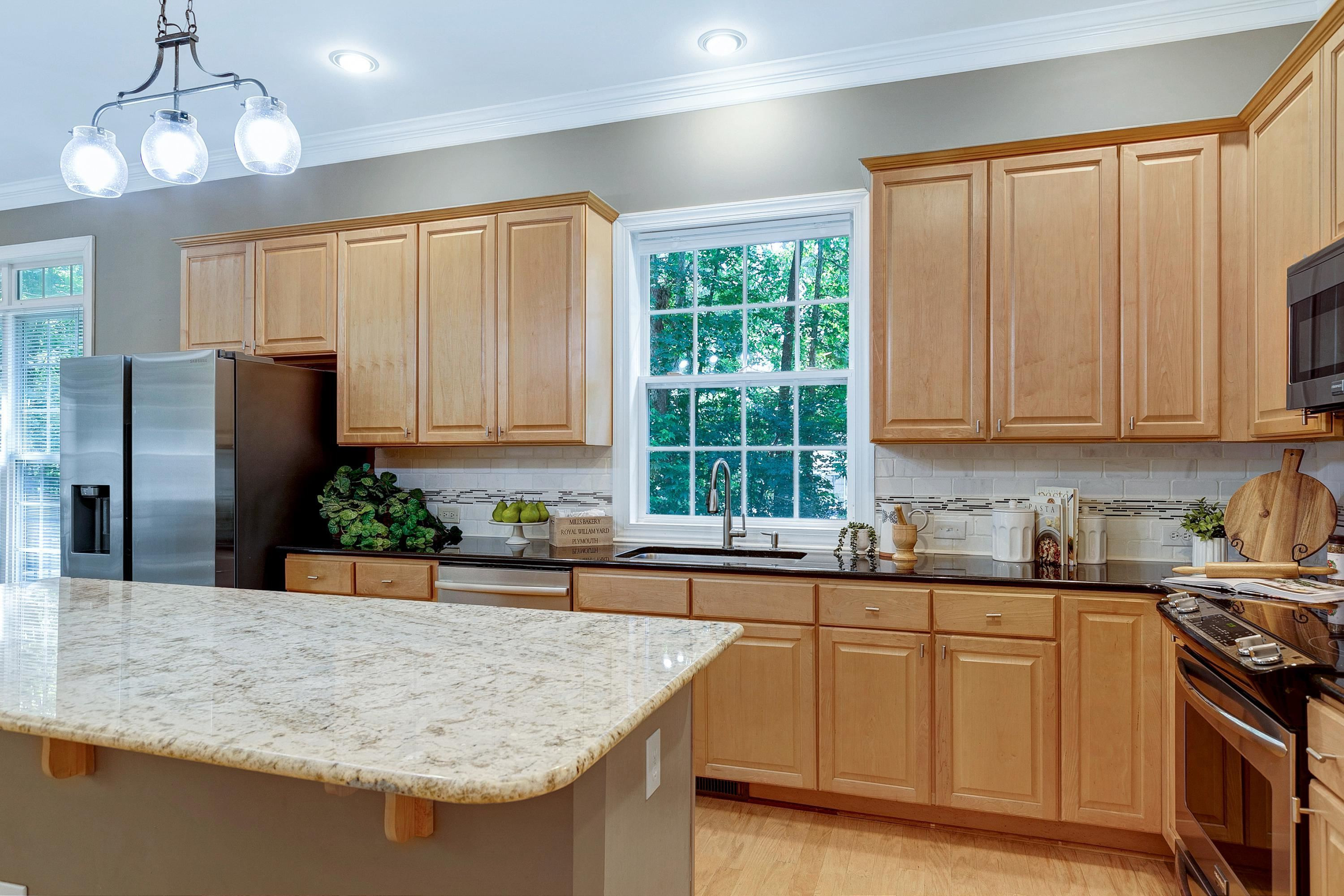 5033 Bartons Enclave Lane Raleigh, NC 27613 - Photo 26 of 58 Stainless steel appliances and the refrigerator conveys. Kitchen