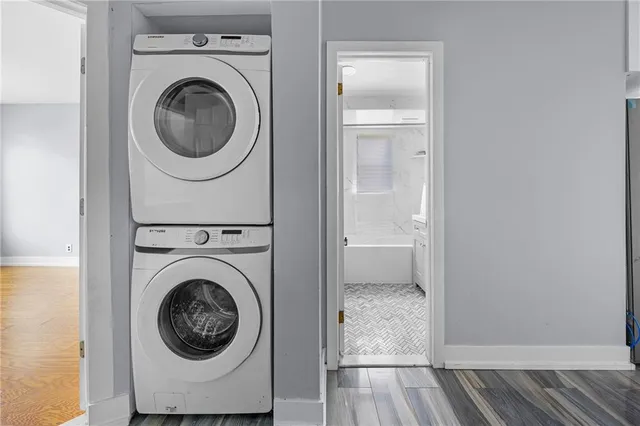 a view of a hallway with washer and dryer