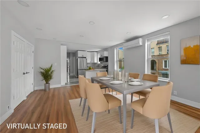 a view of a dining room with furniture