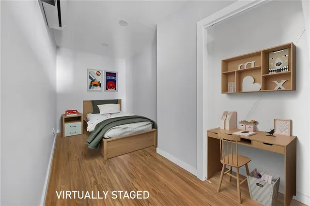 a bedroom with a bed and furniture