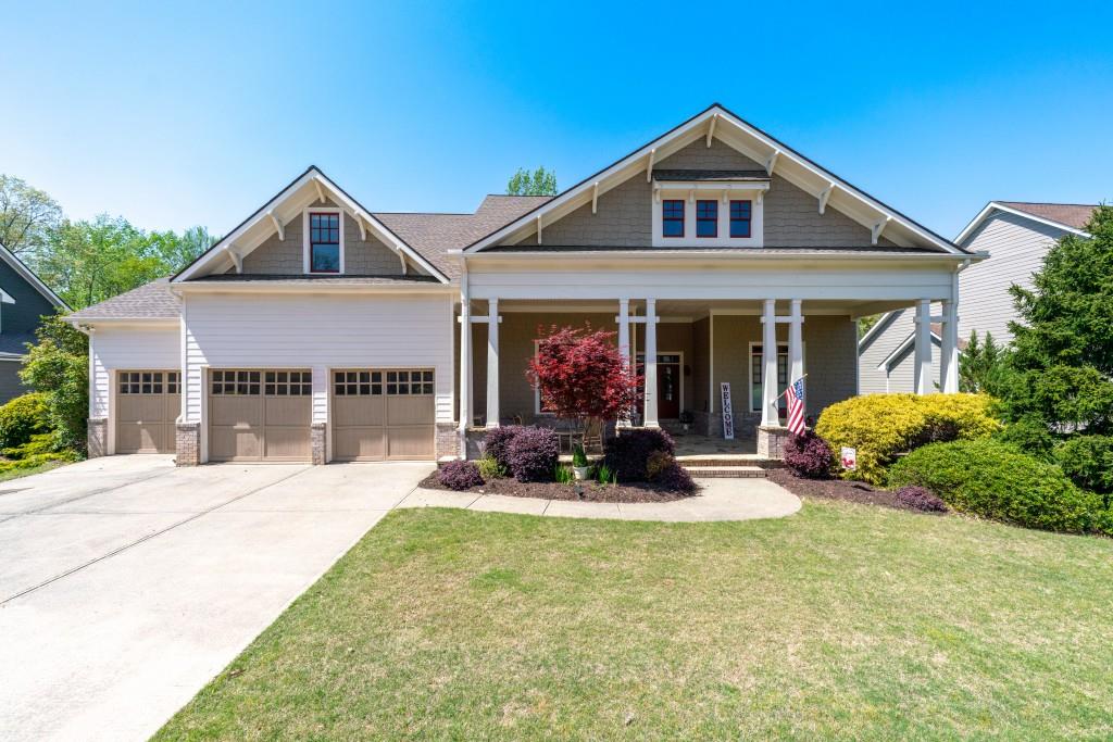 3137 Perimeter Circle Buford, GA 30519 - Photo 1 of 1 a front view of a house with yard and green space