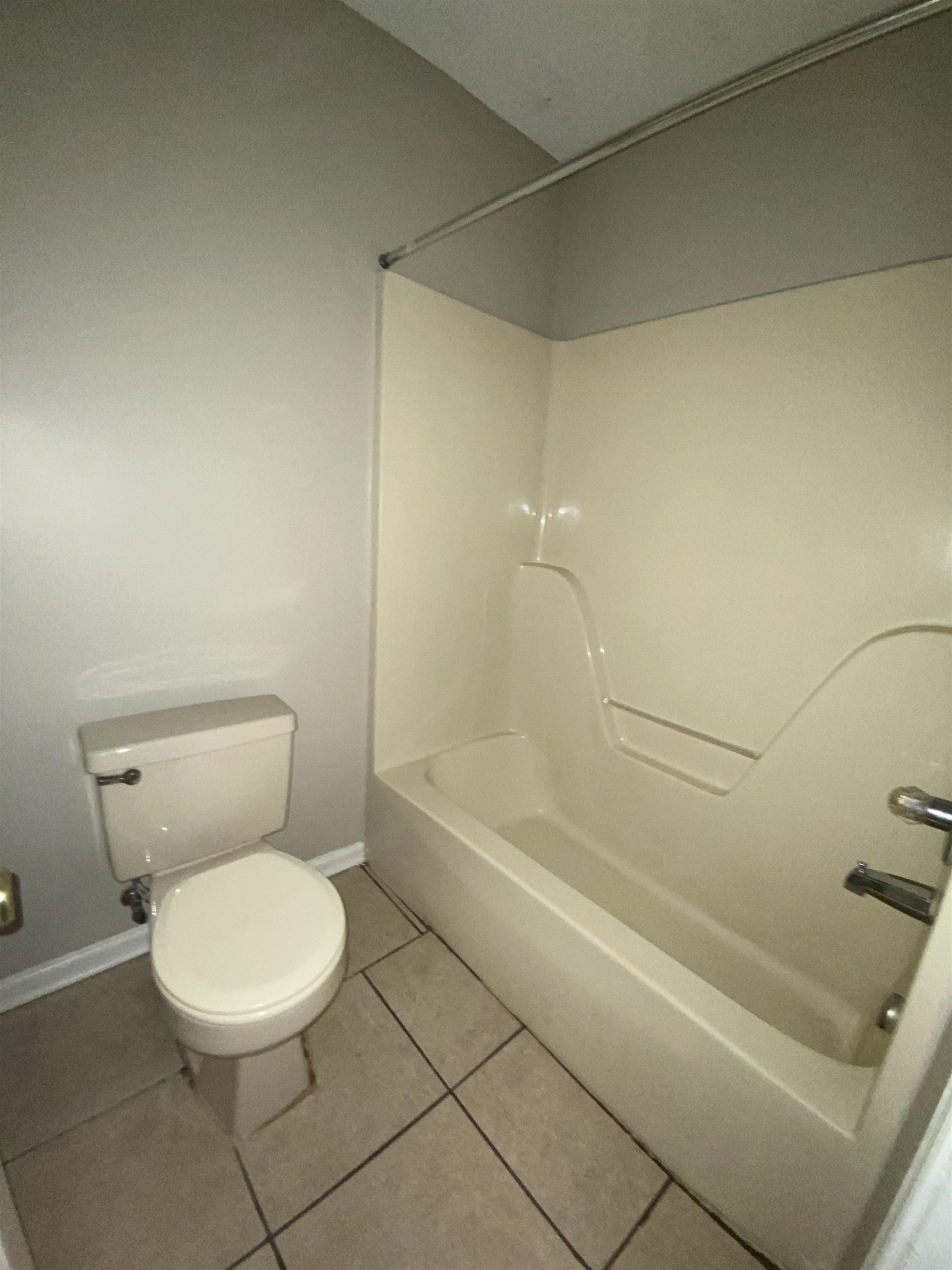 5950 Chadwell Road Millington, TN 38053 - Photo 3 of 14 Full bathroom featuring bathtub / shower combination and tile patterned floors