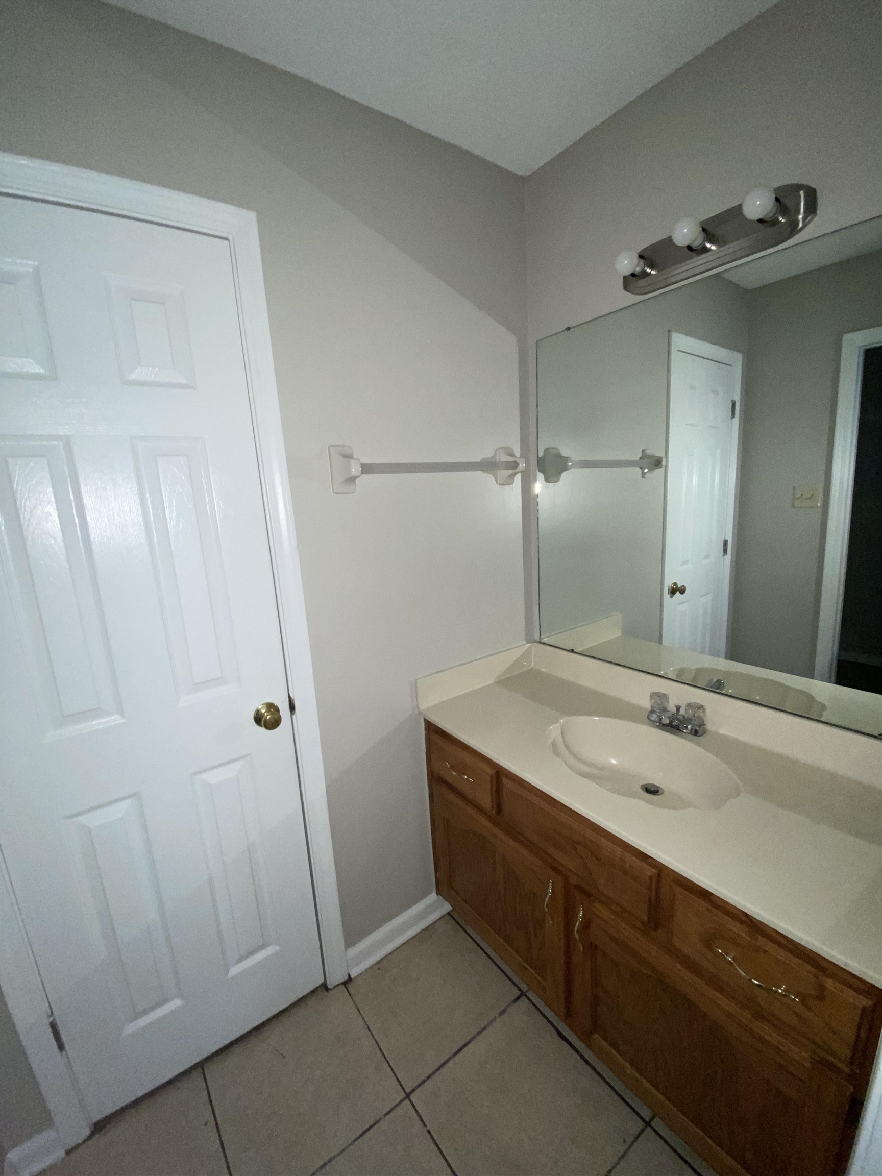 5950 Chadwell Road Millington, TN 38053 - Photo 4 of 14 Bathroom featuring vanity and light tile patterned flooring