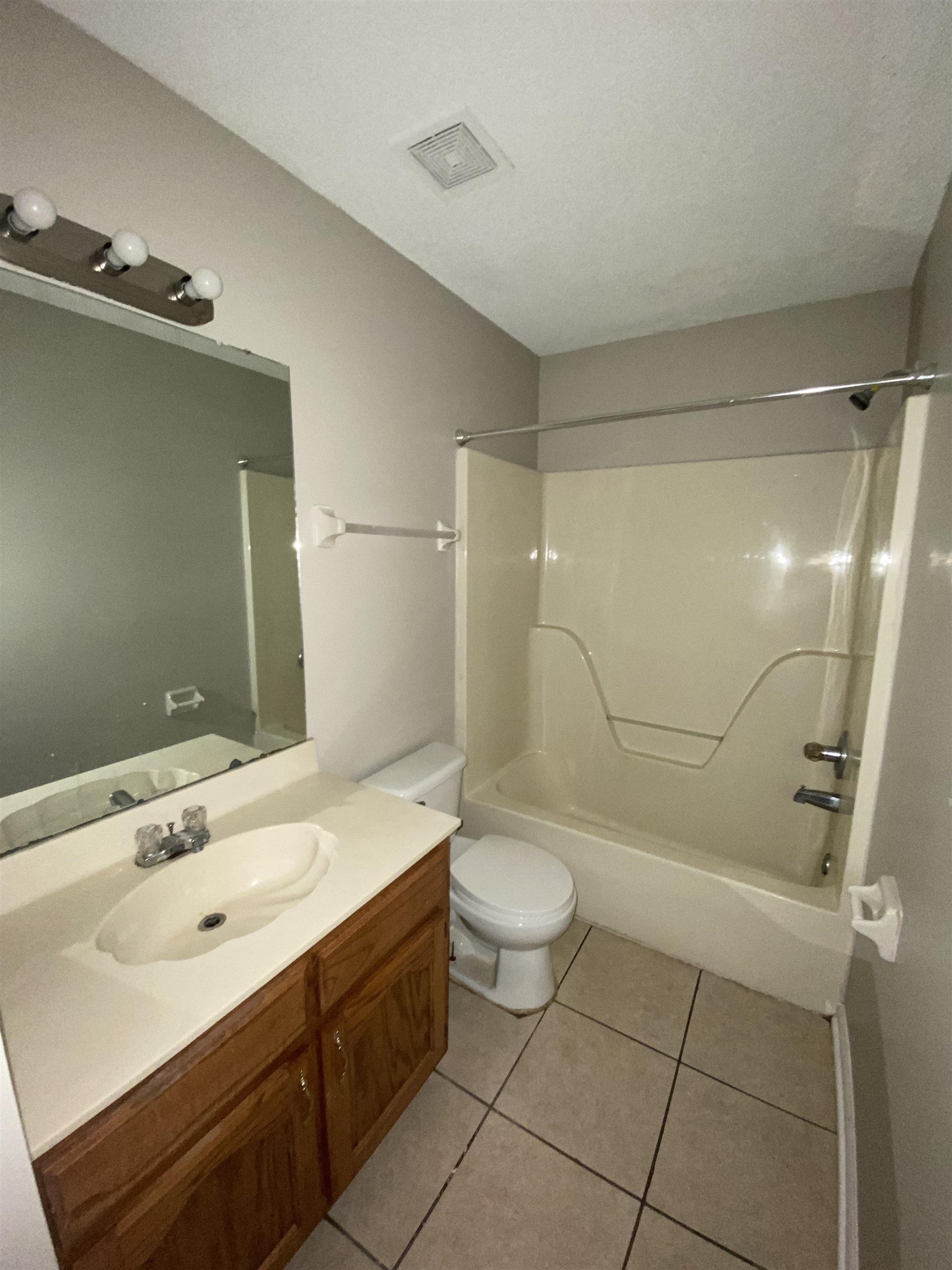 5950 Chadwell Road Millington, TN 38053 - Photo 10 of 14 Full bath with shower / bath combination, vanity, and light tile patterned floors