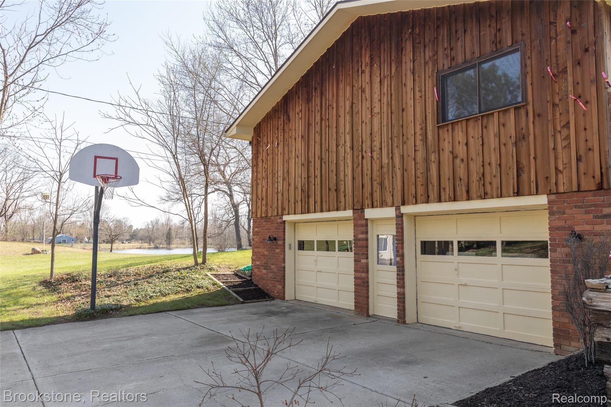 10635 Clark Road Davisburg, MI 48350 - Photo 7 of 33 Attached 2 car garage