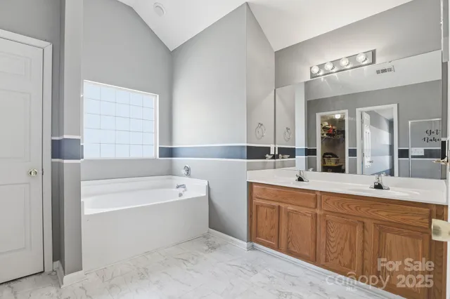 a view of storage and utility room with racks on the wall