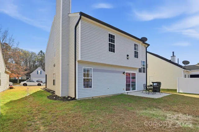 a view of a house with a patio