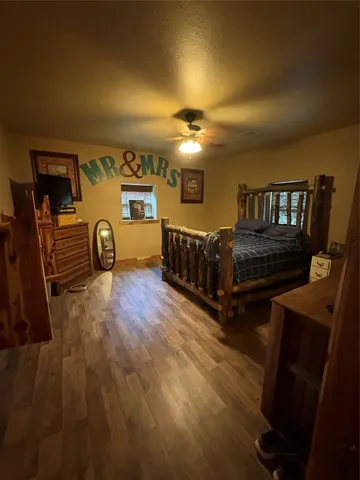 a kitchen with stainless steel appliances a sink a refrigerator and a stove