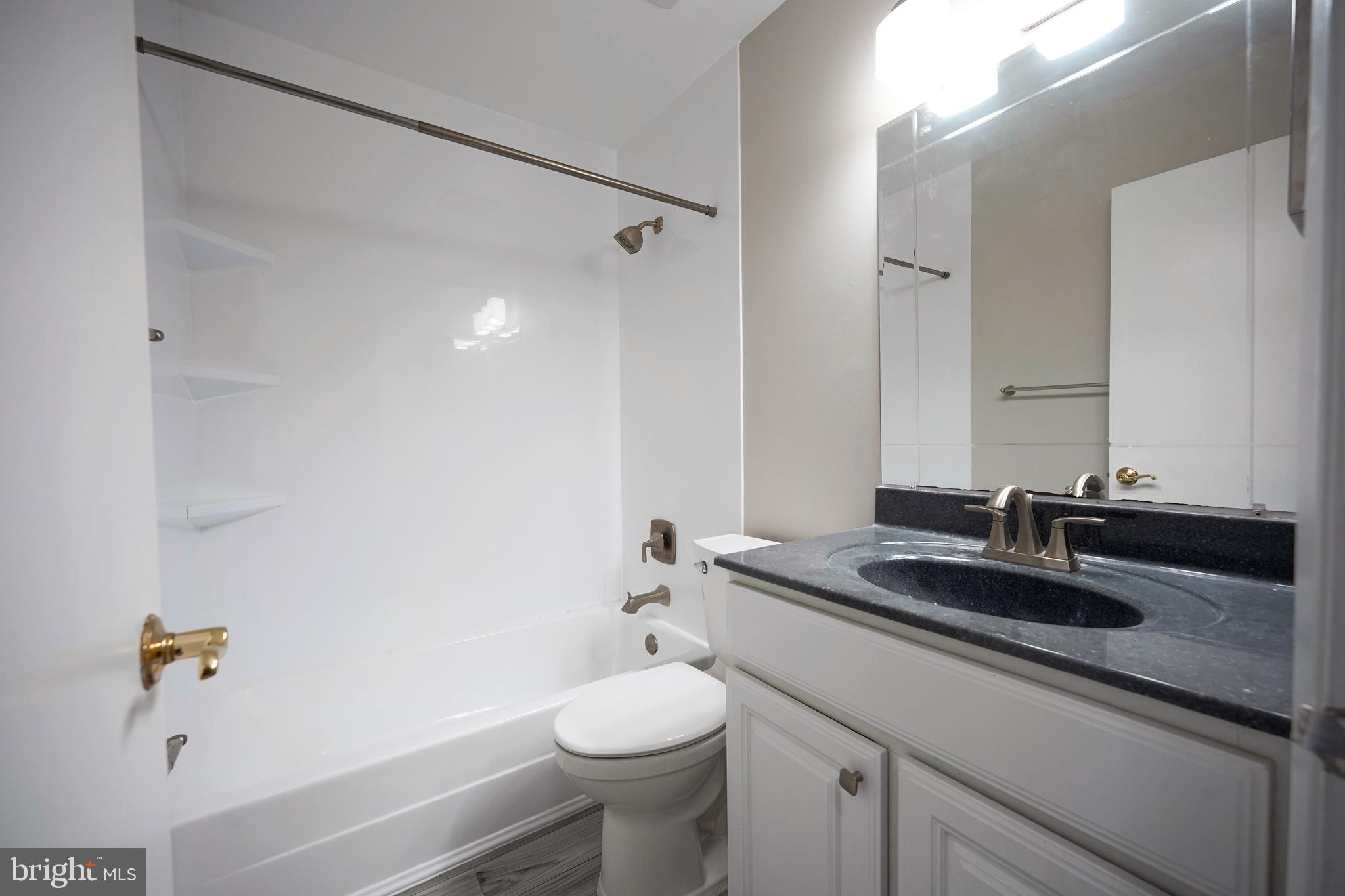 1035 Pendleton Court Voorhees, NJ 08043 - Photo 18 of 29 a bathroom with a sink and a mirror