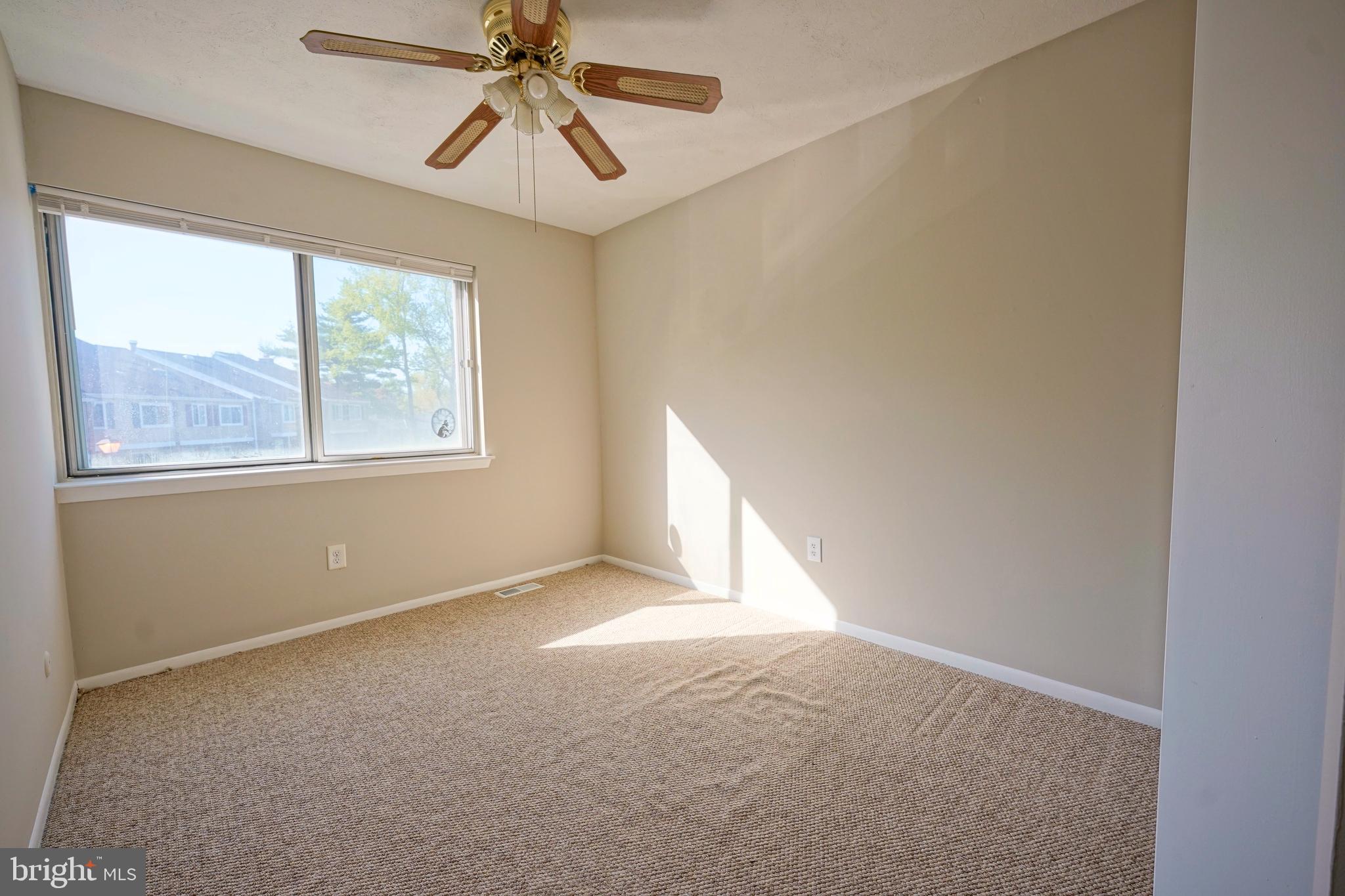 1035 Pendleton Court Voorhees, NJ 08043 - Photo 20 of 29 a view of an empty room with a window