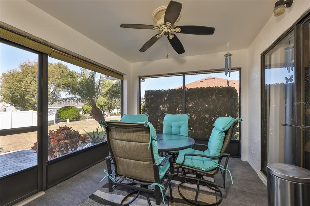 1806 Wedge Court Sun City Center, FL 33573 - Photo 36 of 53 a view of a dining room with furniture window and outside view
